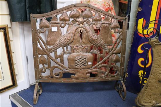 Two Art Nouveau fire screens, copper and brass Both H.76cm